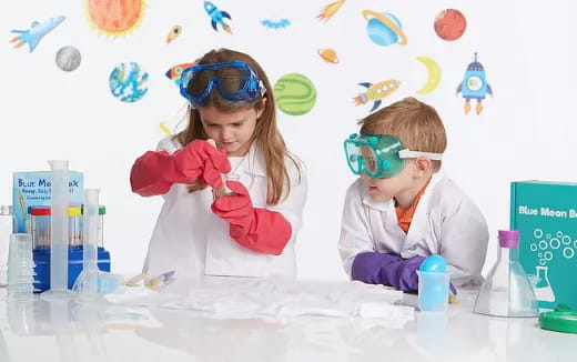 a couple of kids wearing goggles