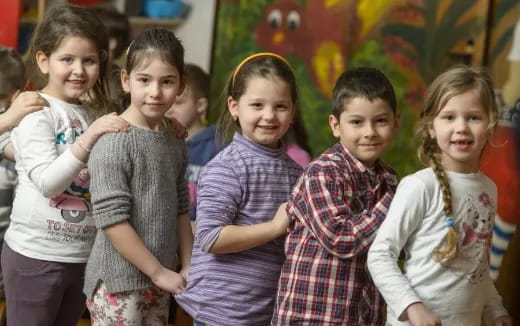 a group of children posing for a photo