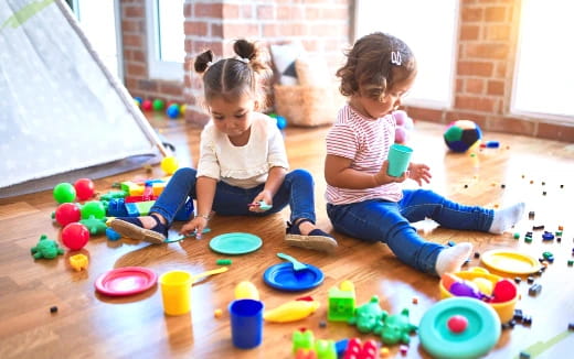 two children playing with toys