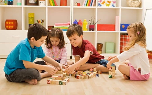 a group of children playing with toys