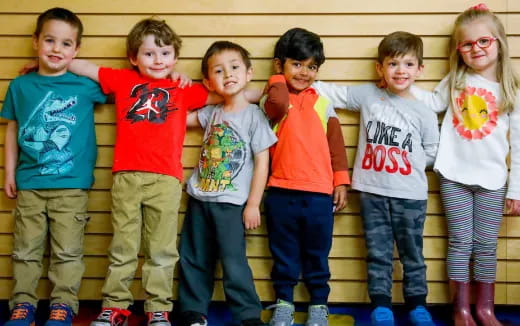 a group of children posing for a photo
