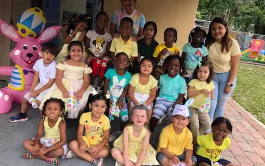 a group of children posing for a photo