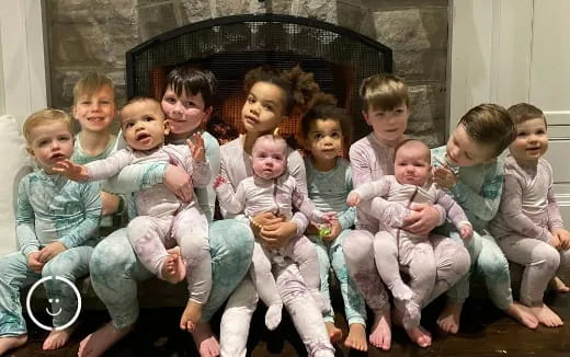 a group of children sitting on a couch