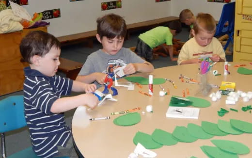a group of children playing with toys