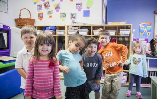 a group of children posing for a photo