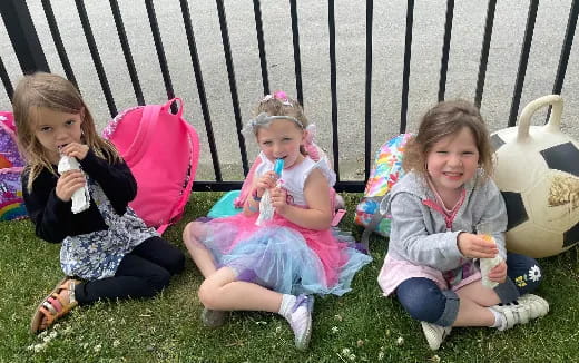 a group of girls eating ice cream