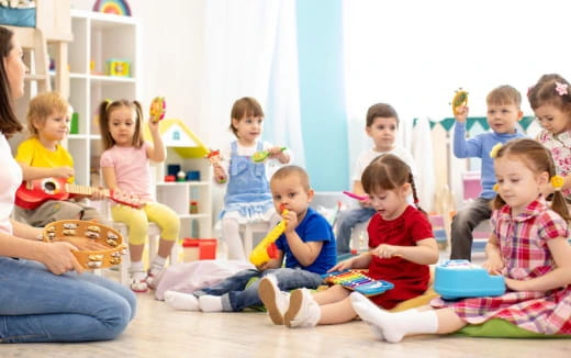 a group of children sitting on the floor