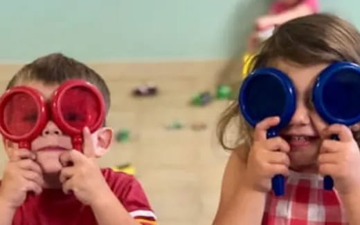 a couple of kids wearing goggles