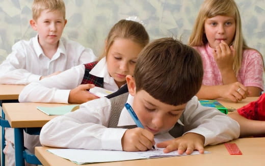 a group of children in a classroom