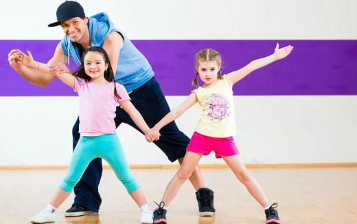 a person and a girl dancing