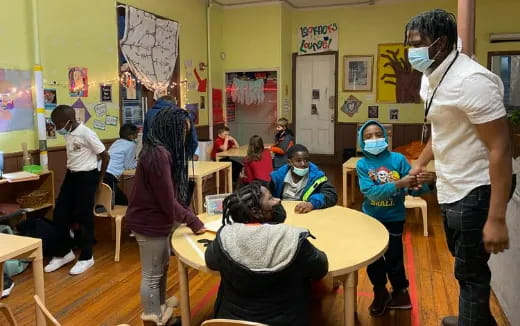 a group of people in a classroom