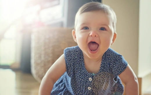 a baby with its mouth open