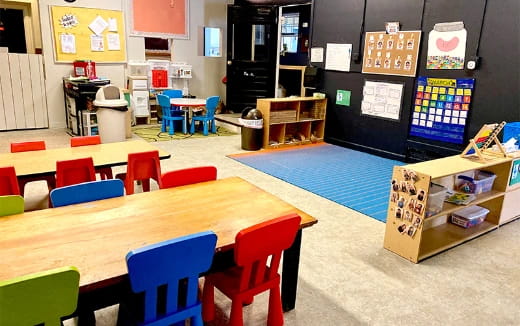 a room with tables and chairs
