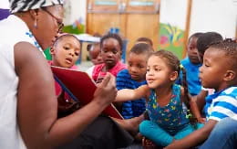 a person and a group of children