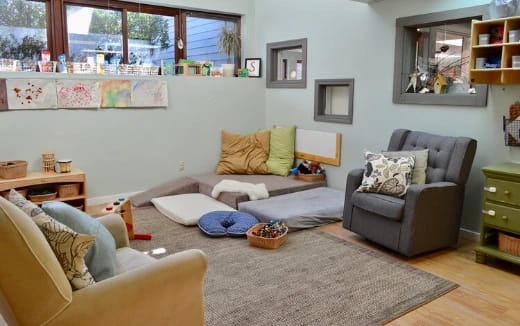 a living room with a couch and a chair