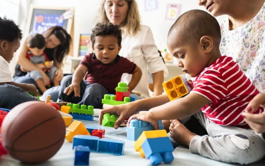 a group of children playing with toys