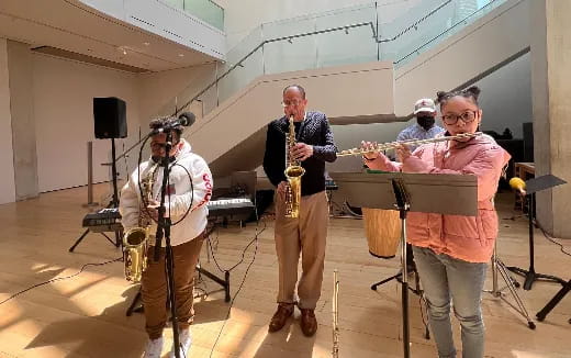 a group of people playing instruments