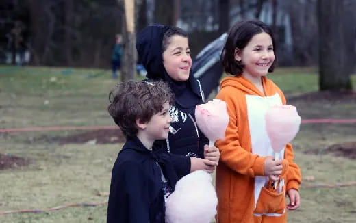 a group of people holding a balloon