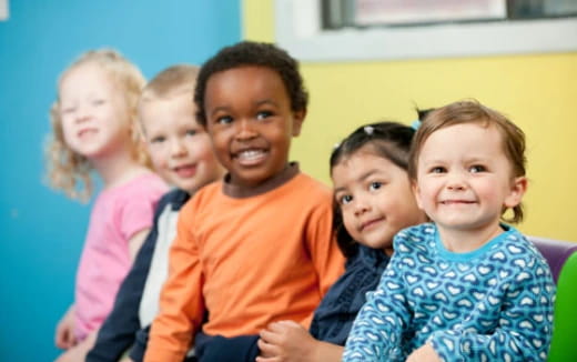 a group of children posing for a photo