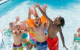 a group of people in the water