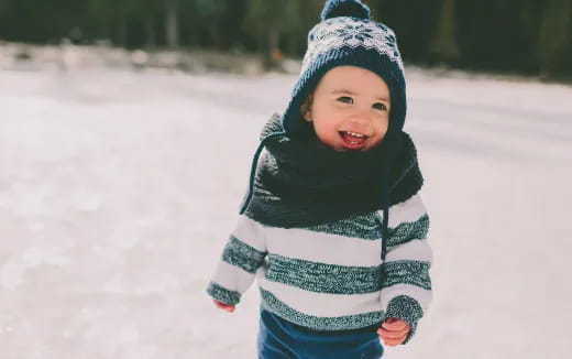 a child in a snowy area