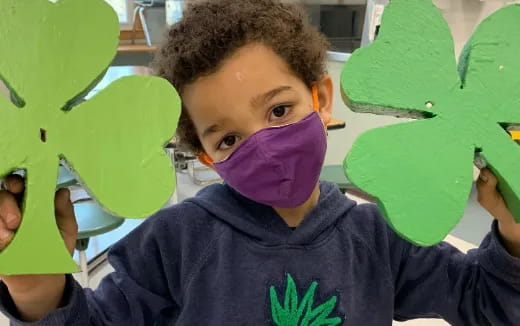 a boy with a mask on