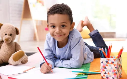 a child sitting at a table