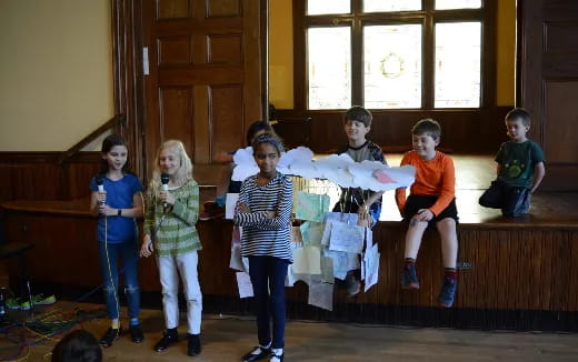 a group of children posing for a photo
