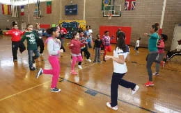 a group of people in a gym
