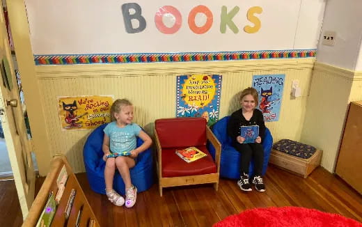 a group of children sitting on a couch