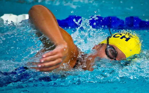 a person swimming in a pool