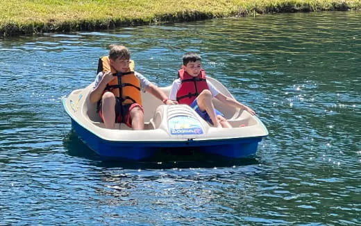 a group of people on a raft