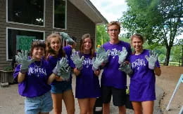 a group of people wearing matching t-shirts