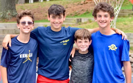 a group of boys posing for a picture