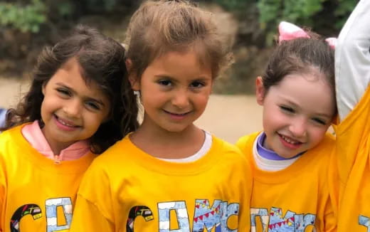 a group of children smiling