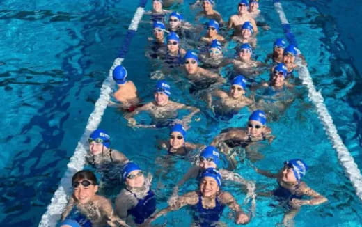 a group of people in a pool
