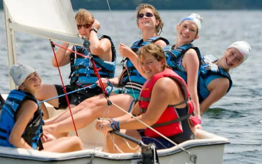 a group of people in a boat