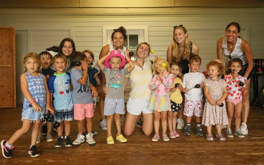 a group of children posing for a photo