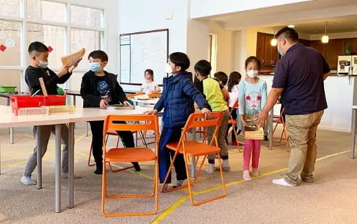 a group of people in a classroom