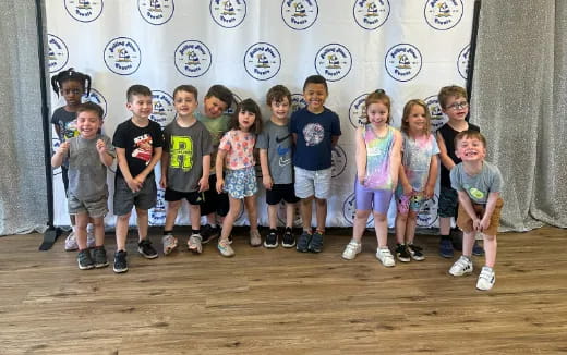 a group of children posing for a photo
