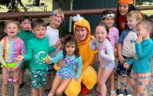 a group of children posing for a photo