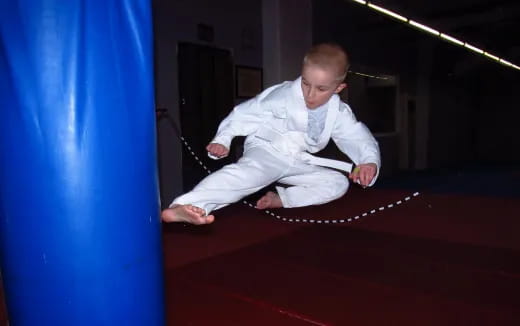 a baby crawling on a red surface