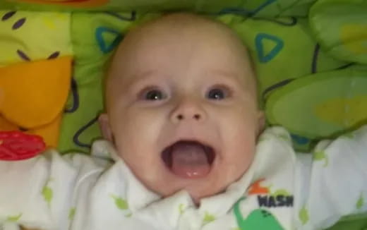 a baby with its mouth open
