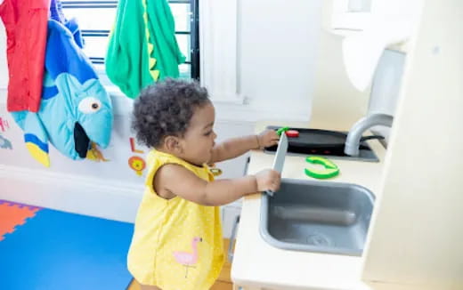 a child playing with a toy