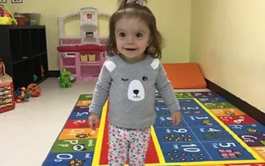 a child standing in a room