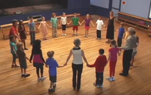 a group of children dancing