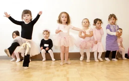 a group of children dancing