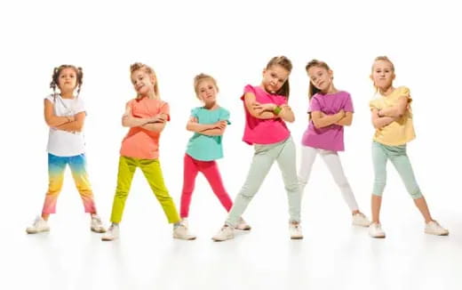 a group of children dancing