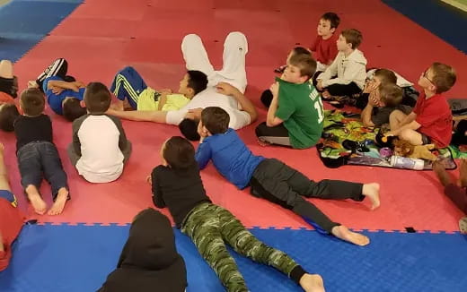 a group of children on a mat