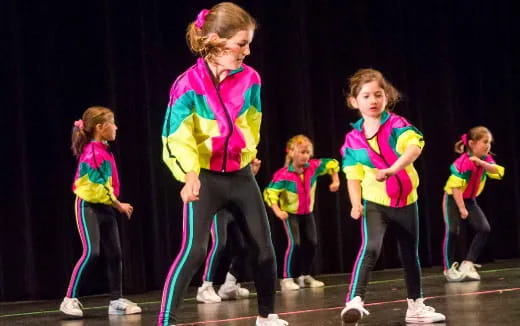 a group of children on a stage